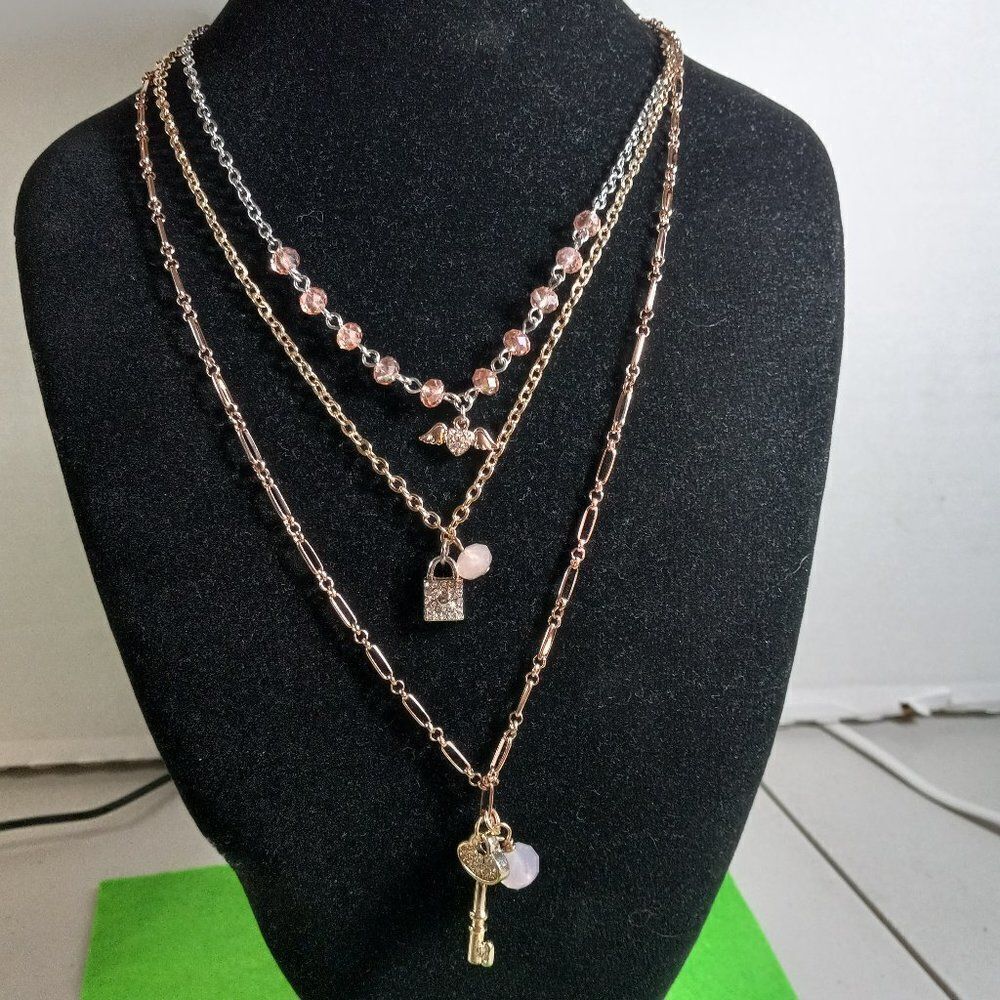 NWT Dune & Willow Three strand Necklace Wings, Lock and Key